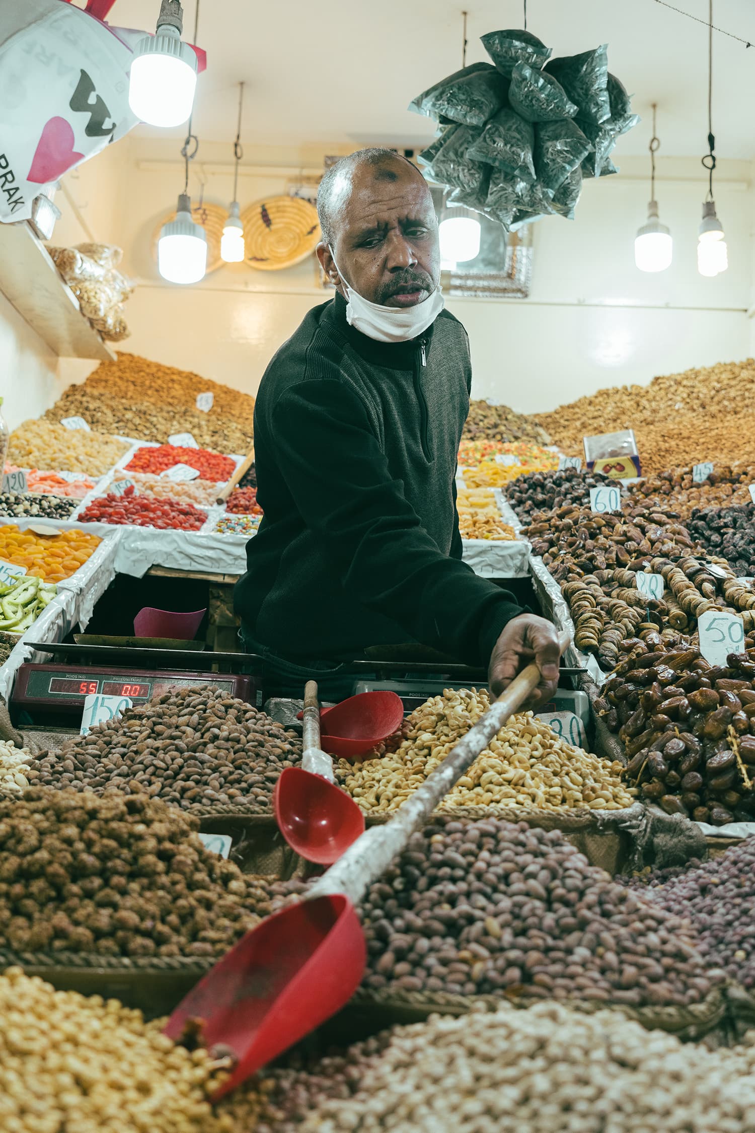 Mountains of Dried Fruit: A Market Vendor in Morocco