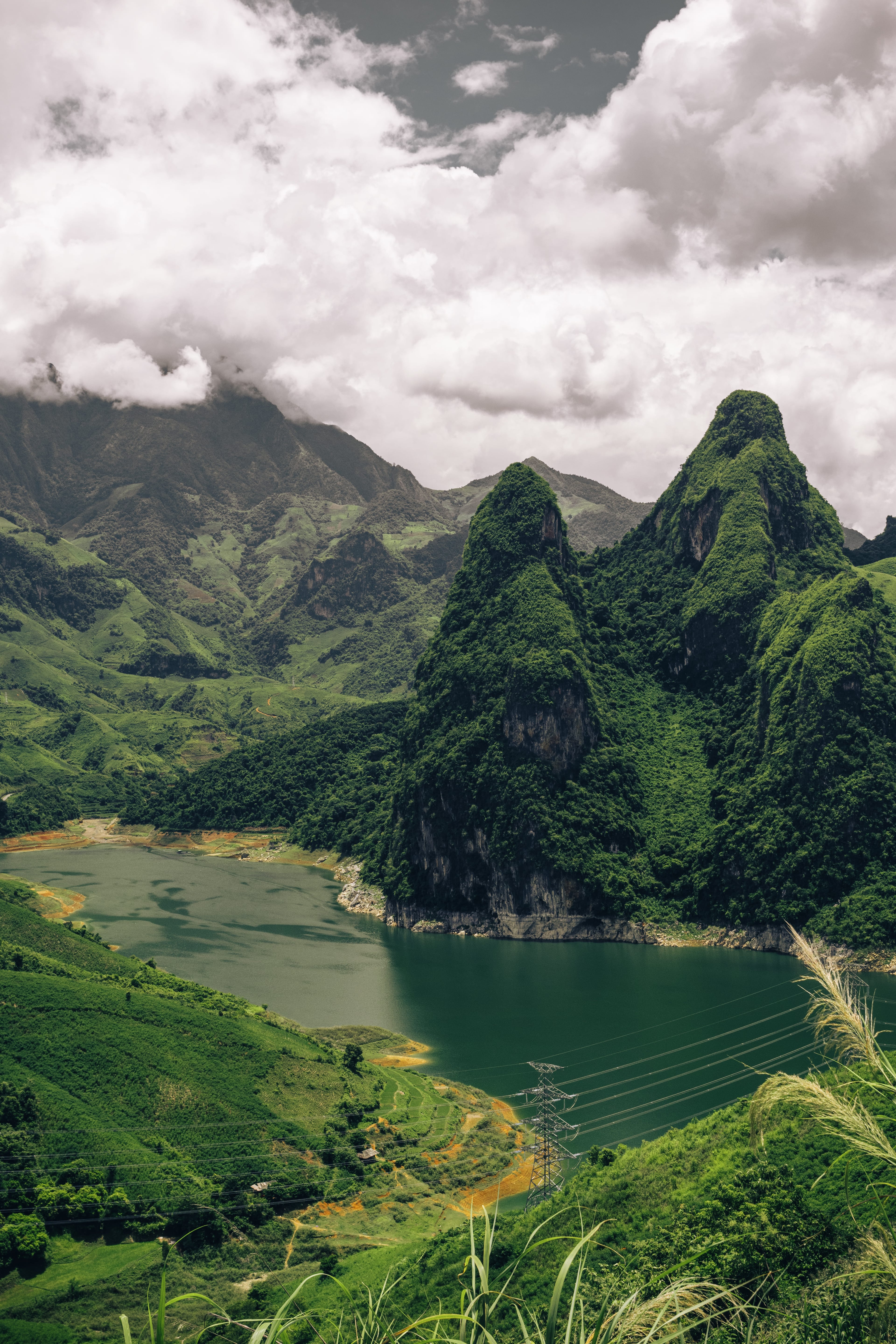 Twin Peaks Over Emerald Water