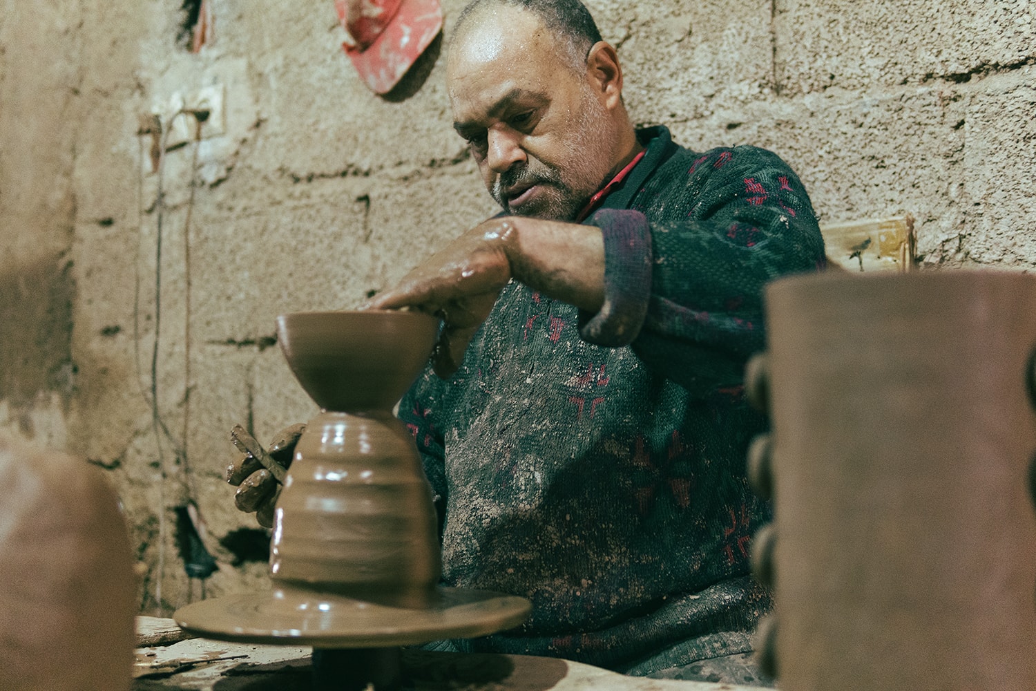 hands in clay